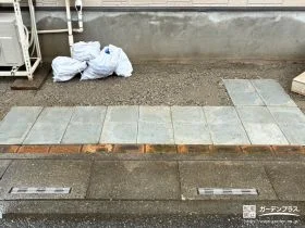 駐輪スペースに雑草対策を施して平らに整えたリフォーム工事