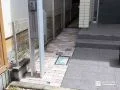 石畳風のアプローチが玄関先にやさしい表情を添える外構工事