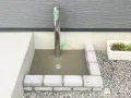 レンガで囲んで使いやすくなったお庭に馴染む水まわり工事