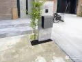 タイル門柱と緑のお庭が調和する機能性にもこだわった外構工事