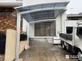 カーポートと高尺フェンスで快適性を高めた外構リフォーム工事