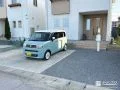 砂利敷きで駐車スペースを整え玄関まわりの動線も整備した工事