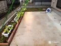土間コンクリートで管理しやすく整えた庭