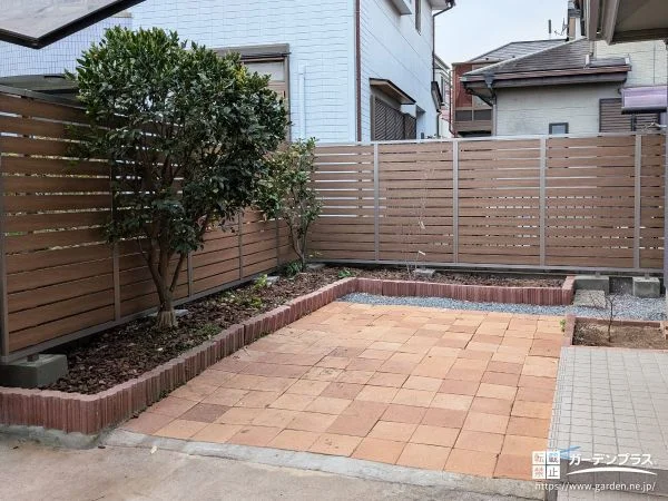 木目調フェンスでお庭を心地よく包み収納スペースも整えた工事