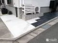 ブラックタイルで足元を引き締め動線を美しく繋ぐアプローチ工事