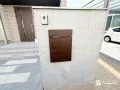 木目をアクセントにした上品な門柱