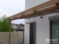木目デザインのテラス屋根