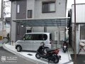 雨の日にも濡れずに車の乗り降りができるカーポートの設置工事