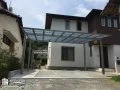リンクストーンとフラットカーポートの美しい佇まいのファサード