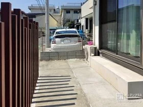 人工木材デザインウォールのシルエットが心和む風景のガーデンリフォーム工事