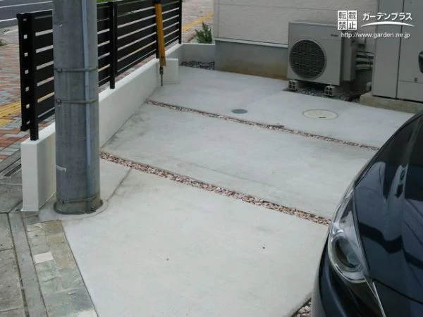 暖色系の砂利目地が温かみのある印象の駐車スペース拡張工事