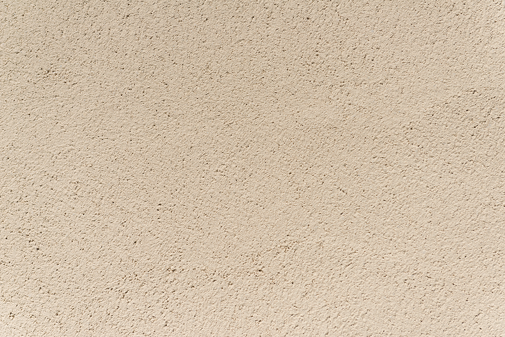 汚れが目立ちにくいベージュの塗り壁